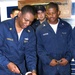 The oldest Sailor on board USS Dextrous (MCM 13), serves cake to younger me