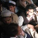 Injured Pakistani Citizens Sit on the Floor of an MH-53 Sea Stallion