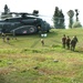 Pakistani Soldiers Run to Unload Relief Supplies