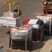 A Sailor Unloads Pallets of Flour, Milk and Bread