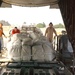 A Sailor helps to load pallets bound for Pakistan