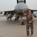 Maj. Darren Censullo does a pre-flight walk around his F-16
