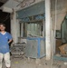 U.S. Soldiers survey Palestine Hotel damage