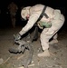 U.S. Soldiers survey Palestine Hotel damage