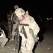 U.S. Soldiers survey Palestine Hotel damage