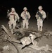 U.S. Soldiers survey Palestine Hotel damage