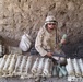 Sgt. Maj. Diceglie with captured ammunition
