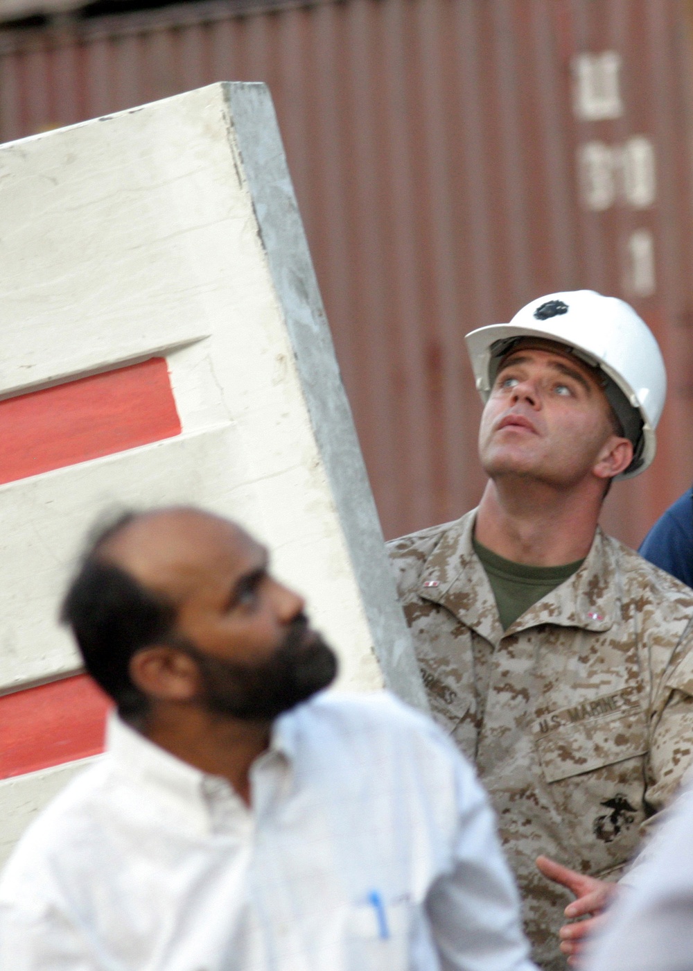 CWO Childress Keeps a Watchful Eye on Relief Supplies Being Offloaded