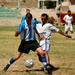 Iraqi and US Soldiers play soccer