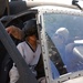 An Iraqi child gets a look at the black hawk helicopter with CW3