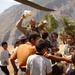 SSG Bill Gard hands out toys to Iraqi children