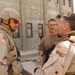 Maj. Gen. David Rodriguez talks to local Soldiers who are training