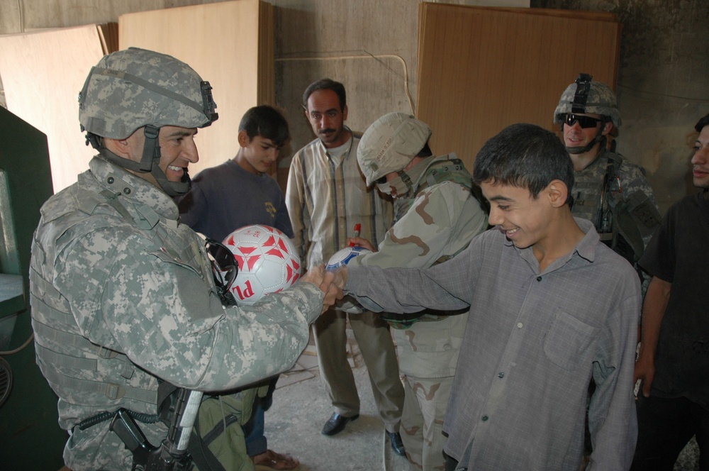 Stryker Soldiers beat the street, gather information to help Iraq