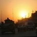 A Rhode Island National Guard unit is silhouetted by the setting sun