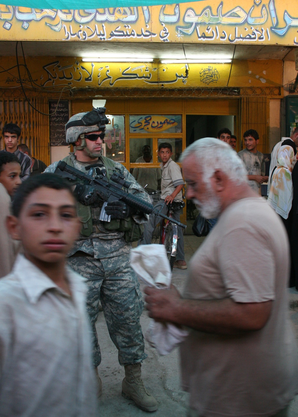 Spc. Joseph Monteiro patrols the Husseiniya market