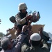 Iraqi, U.S. Soldiers bring food, water to needy families