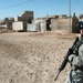 Iraqi, U.S. Soldiers bring food, water to needy families