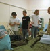 Adema band members visit a wounded Soldier