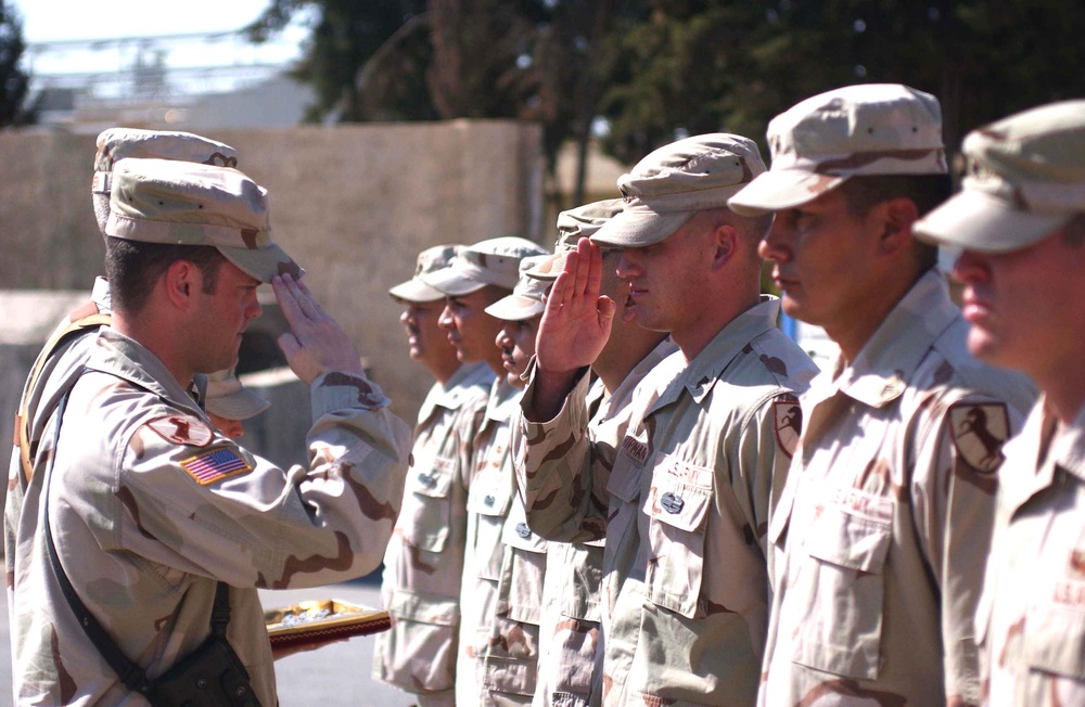 A Soldier salutes Capt. Bryan Harris