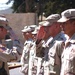 A Soldier salutes Capt. Bryan Harris