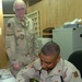 Maj. Santiago signs a dinar check