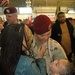 Spc. Mark Reali hugs his wife and daughter