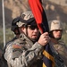 Command Sgt. Maj. Frank A. Grippe accepts the Division's Colors