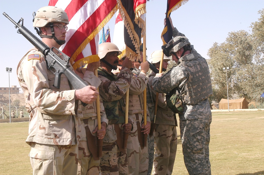 CSM Grippe places his Division's Colors in the 42nd Infantry Divisio