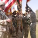 CSM Grippe places his Division's Colors in the 42nd Infantry Divisio