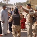 Iraqi Army brings food to Abu Ghraib residents