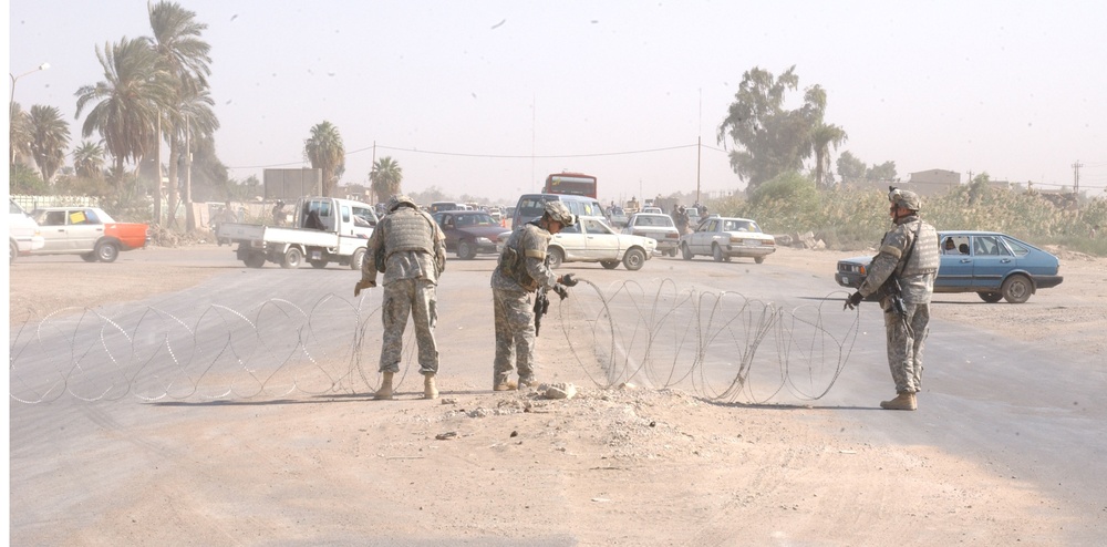 Iraqi Army brings food to Abu Ghraib residents