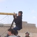 Children Tie a Net Onto New Soccer Posts