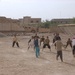 A Group of Iraqi Children Play a Soccer Game