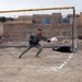 Maj. Masaracchia Reaches for a Soccer Ball