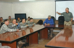 Medal of Honor recipients Gary Littrell and John McGinty III visit with Sol