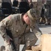 Staff Sgt. Ron Eberhardt says a prayer for fallen Soldiers