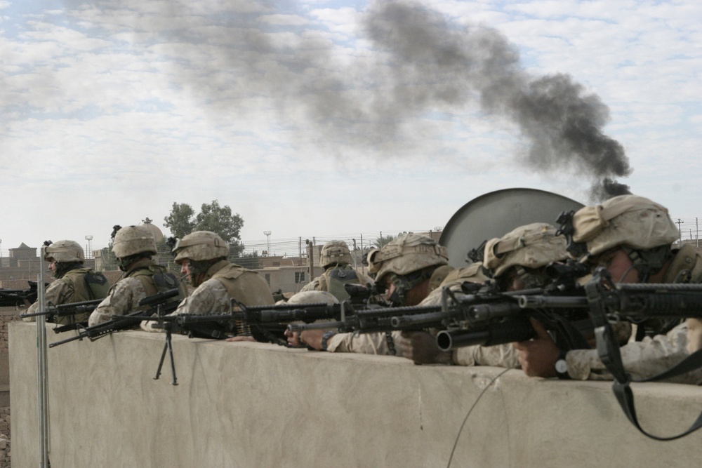 Marines fire upon an enemy location during Operation Steel Curtain