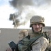 A Marine watches over the streets of Husaybah