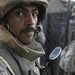 A member of the Iraqi Army prepares to clear a house during Operation Steel