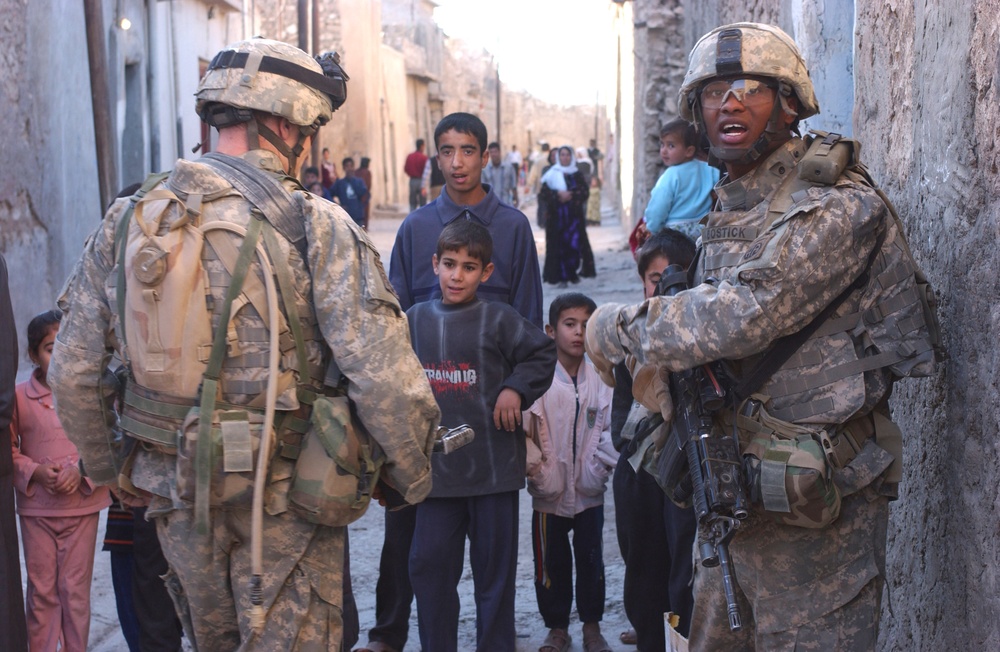 Staff Sgt. Bostick gives orders to his men