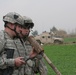 Capt. Matt Ruckman and Staff Sgt. Joel Killian inspect firing devices