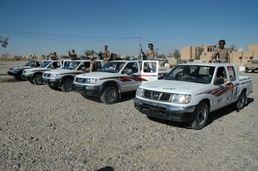Iraqi Soldiers get ready to convoy to Samara
