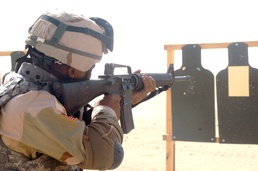 Staff Sgt. Leonard Phillips engages his target