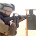 Staff Sgt. Leonard Phillips engages his target