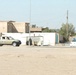 Iraqi Army personnel respond to the scene of a car bombing