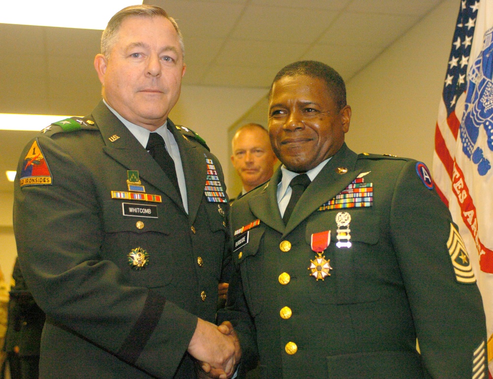 Sgt. Maj. Burnside shakes the hand of Lt. Gen. Whitcomb