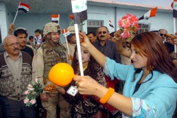 Iraqis celebrate new school opening