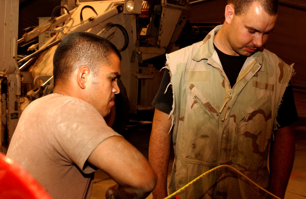 Air Force mechanics raise the Vehicle In Commission rate