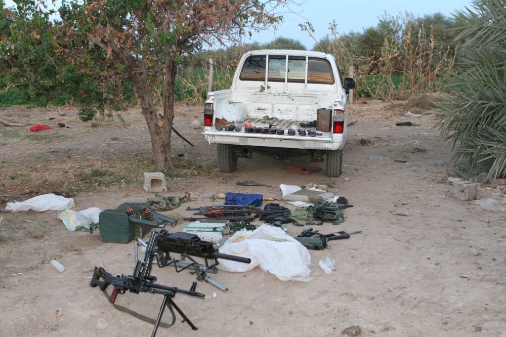 Soldiers find weapons caches, terrorists on island