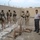 Iraqi Firefighters Turn Over Unexploded Ordnance